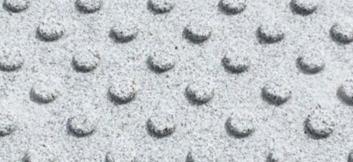 Blister tactile tile, with buttons according the French standard, in granite Gris Louro